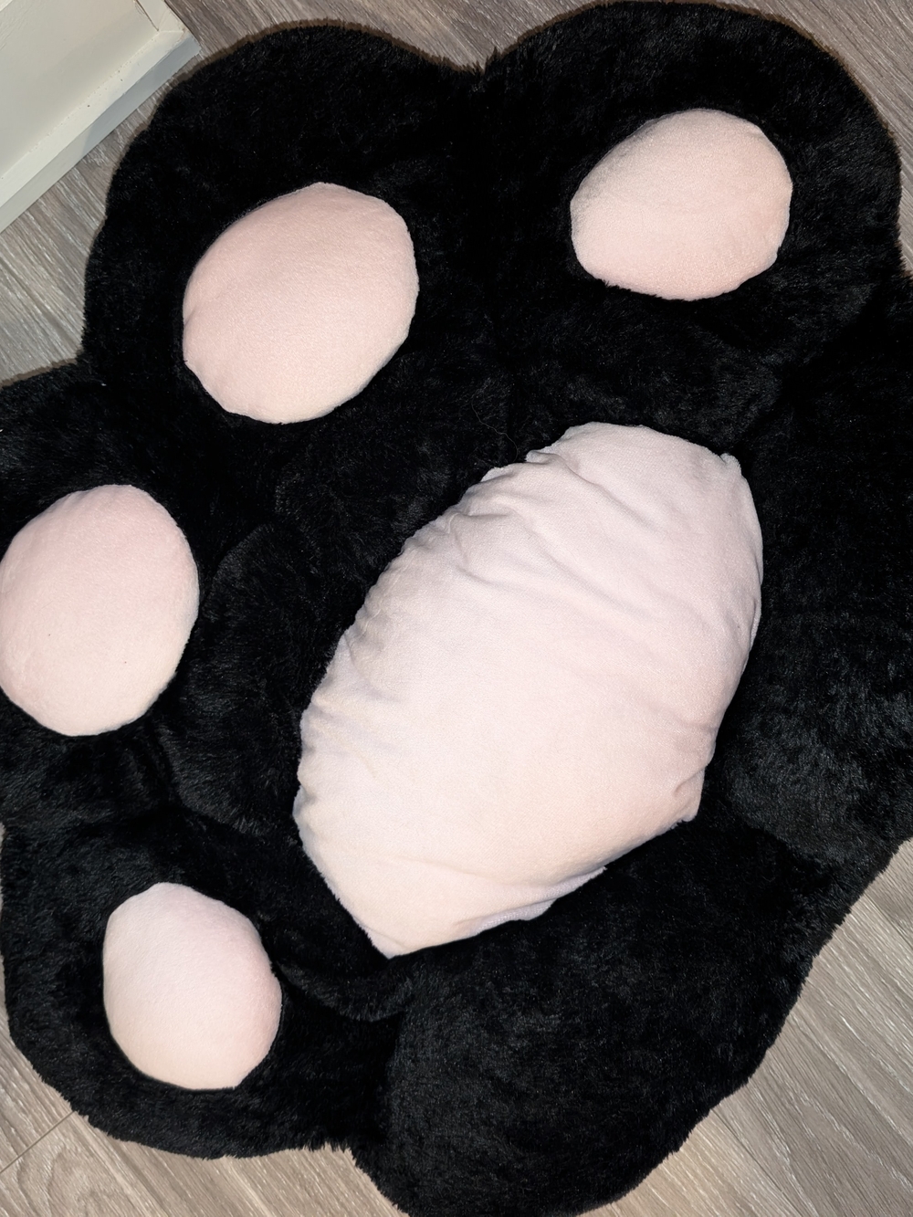 Plush Black Pet Paw Mat with Light Pink Pads
